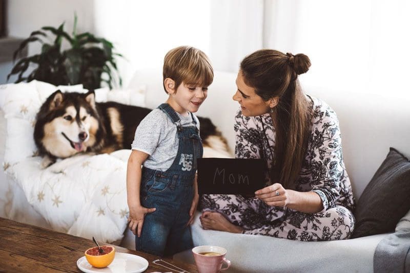 Mother playing with her child.