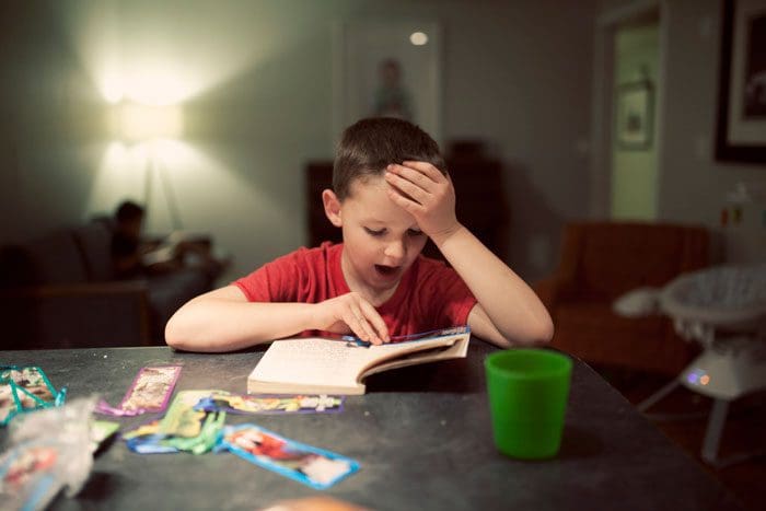 Boy reading a book.