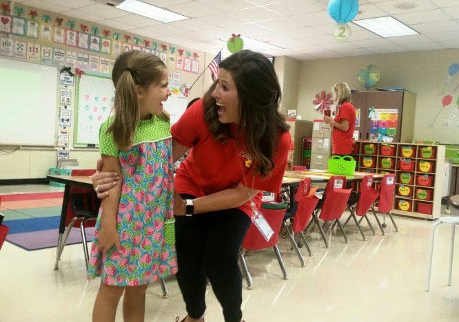 Teacher and child in classroom