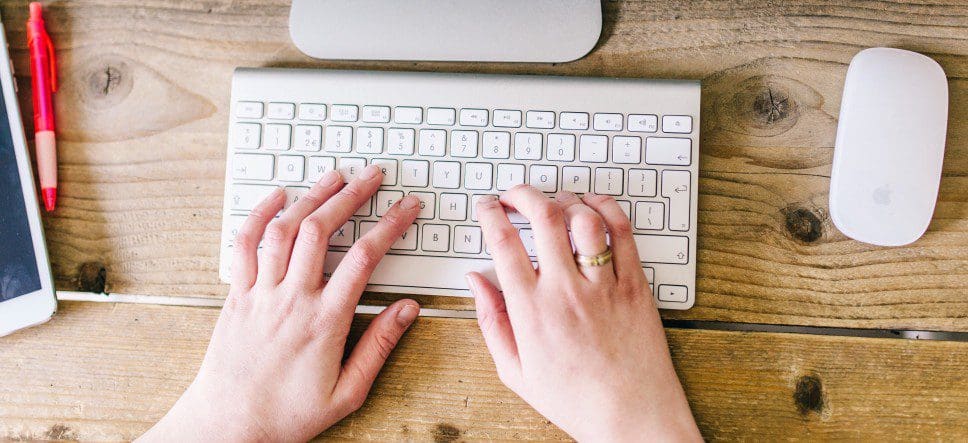 Hands on a keyboard.