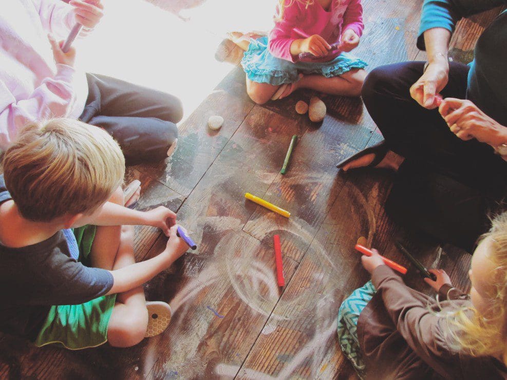 Children coloring together