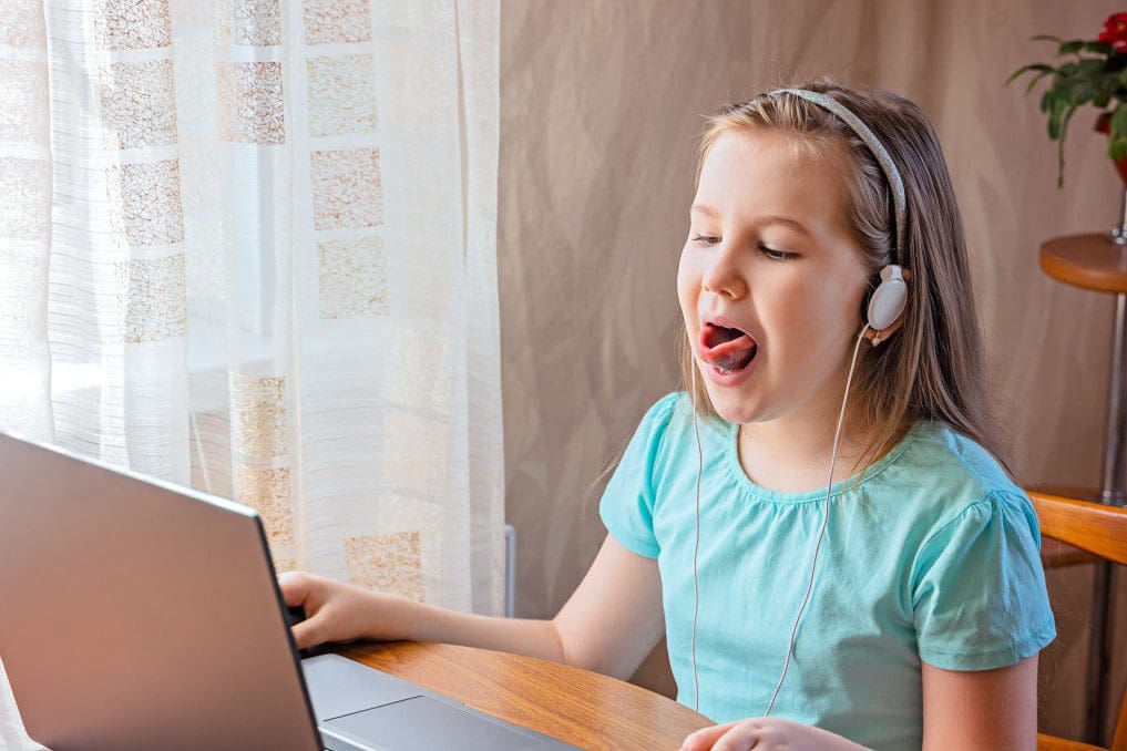 A girl in speech language therapy.