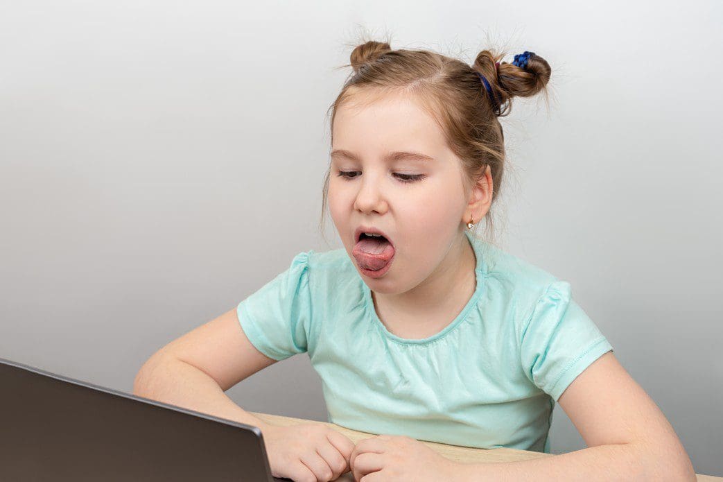 Child in speech therapy virtually.