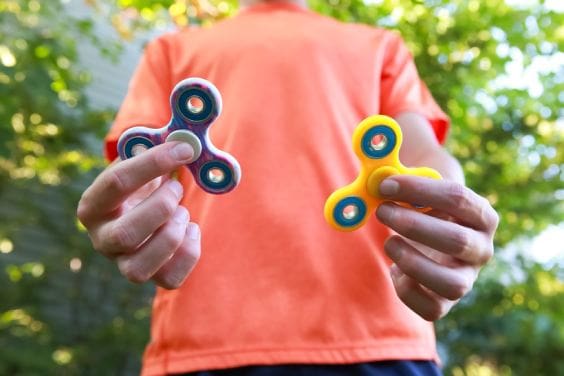 A child plays with sensory toys